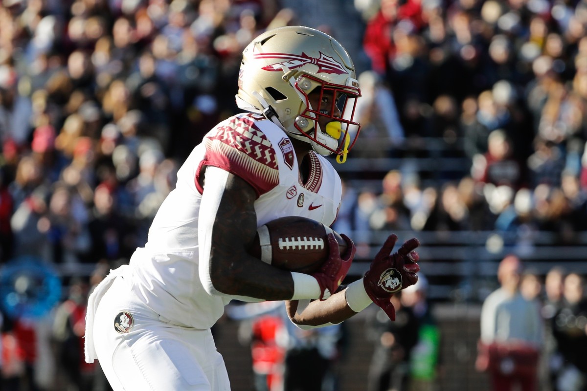 Nov 20, 2021; Chestnut Hill, Massachusetts, USA; Florida State Seminoles running back Jashaun Corbin (0) runs against the Boston College Eagles during the first half at Alumni Stadium.