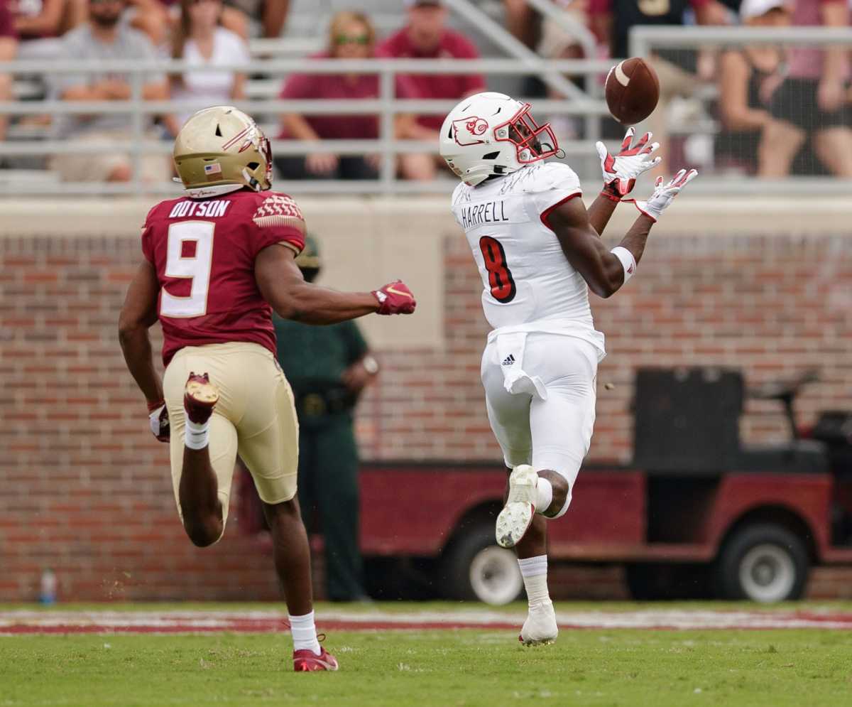 Louisville Cardinals wide receiver Tyler Harrell (8) catches a pass and runs it in for a touchdown. The Louisville Cardinals lead the Florida State Seminoles 31-13 at the half Saturday, Sept. 25, 2021.
