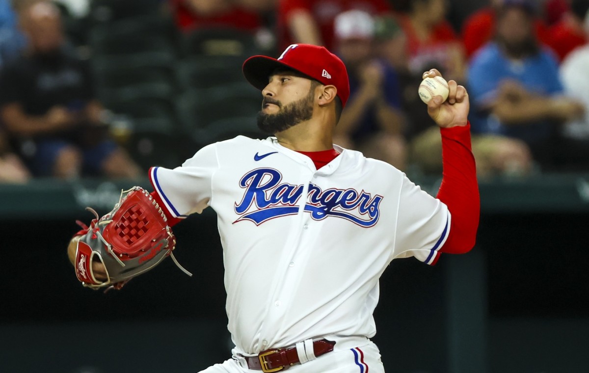 Apr 12, 2022; Arlington, Texas, USA; Texas Rangers starting pitcher Martin Perez (54) throws during the first inning against the Colorado Rockies at Globe Life Field. Mandatory Credit: Kevin Jairaj-USA TODAY Sports