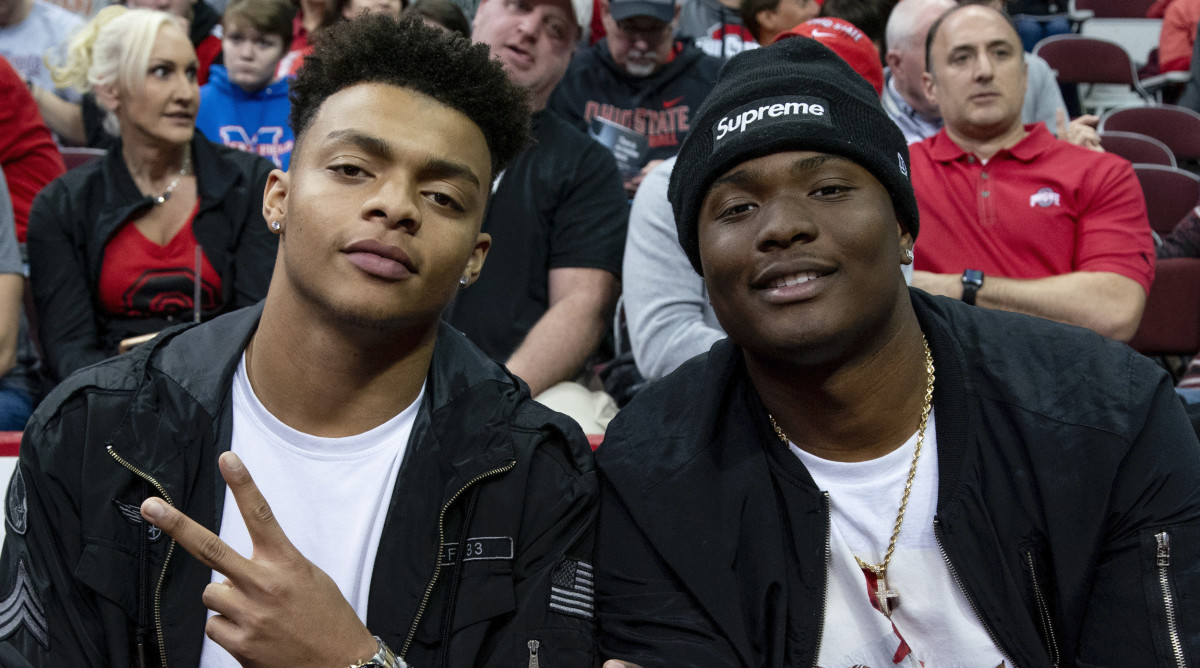 Former Georgia Bulldogs quarterback Justin Fields and Ohio State Football Quarterback Dwayne Haskins pose for a photo during the game between the Ohio State Buckeyes and the Michigan State Spartans at the Value City Arena in Columbus, Ohio on January 5, 2019.
