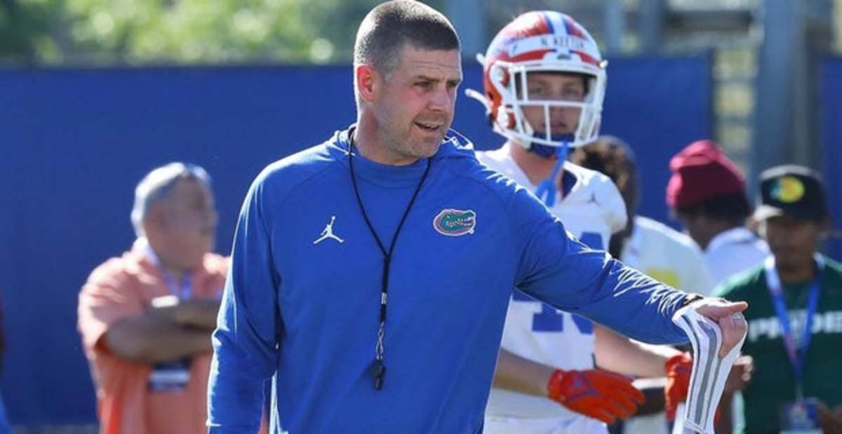 Florida Gators head coach Billy Napier instructs players at a practice during the college football season.