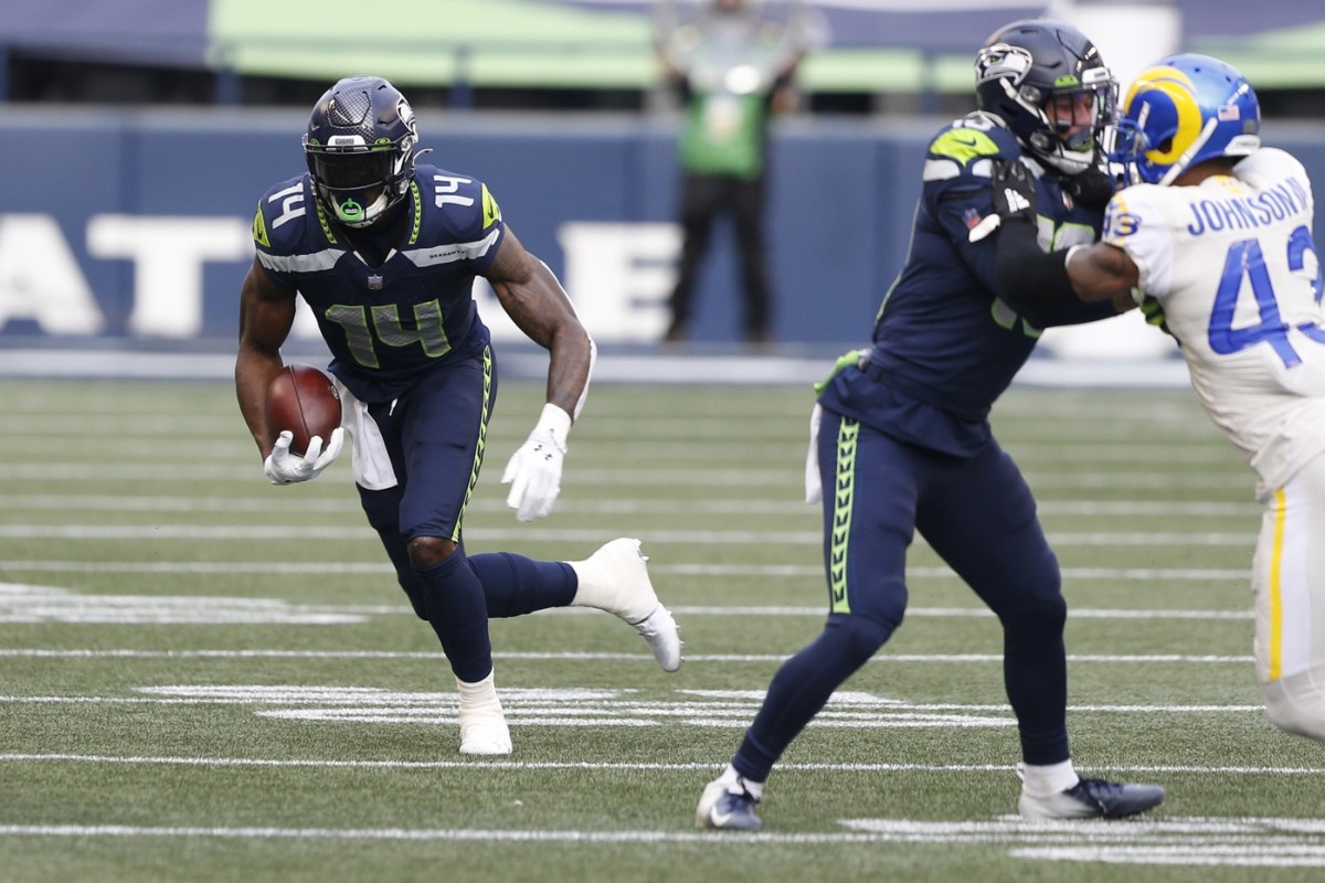 Seattle Seahawks wide receiver DK Metcalf (14) runs for yards after the catch against the Los Angeles Rams. Mandatory Credit: Joe Nicholson-USA TODAY Sports