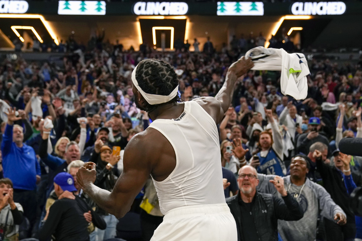 Apr 12, 2022; Minneapolis, Minnesota, USA; Minnesota Timberwolves guard Patrick Beverley (22) throws his jersey into the crowd after the Timberwolves secured a play-off spot by defeating the Los Angeles Clippers in a play-in game at Target Center. Mandatory Credit: Nick Wosika-USA TODAY Sports