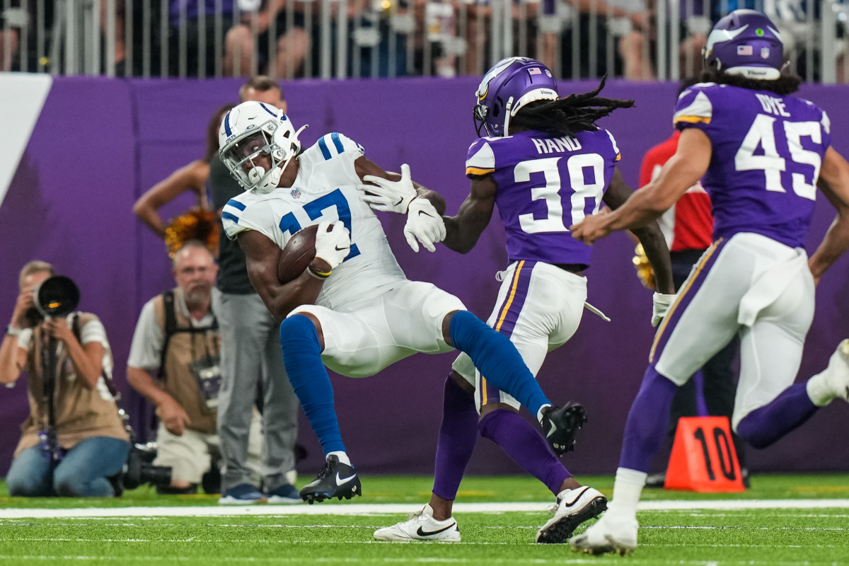 Aug 21, 2021; Minneapolis, Minnesota, USA; Indianapolis Colts wide receiver Mike Strachan (17) is tackled by Minnesota Vikings cornerback Harrison Hand (38) during the second quarter at U.S. Bank Stadium.