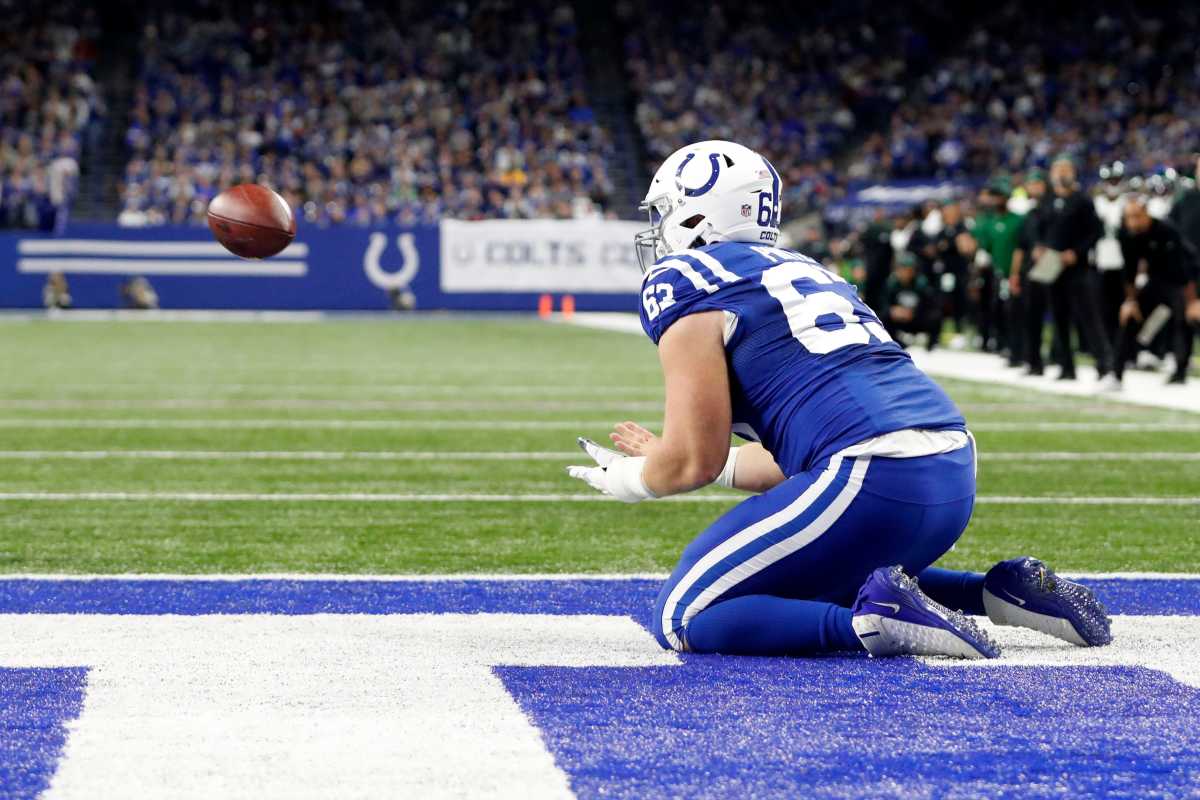 Indianapolis Colts guard Danny Pinter (63) scores his career-first touchdown Thursday, Nov. 4, 2021, during a game against the New York Jets at Lucas Oil Stadium in Indianapolis.