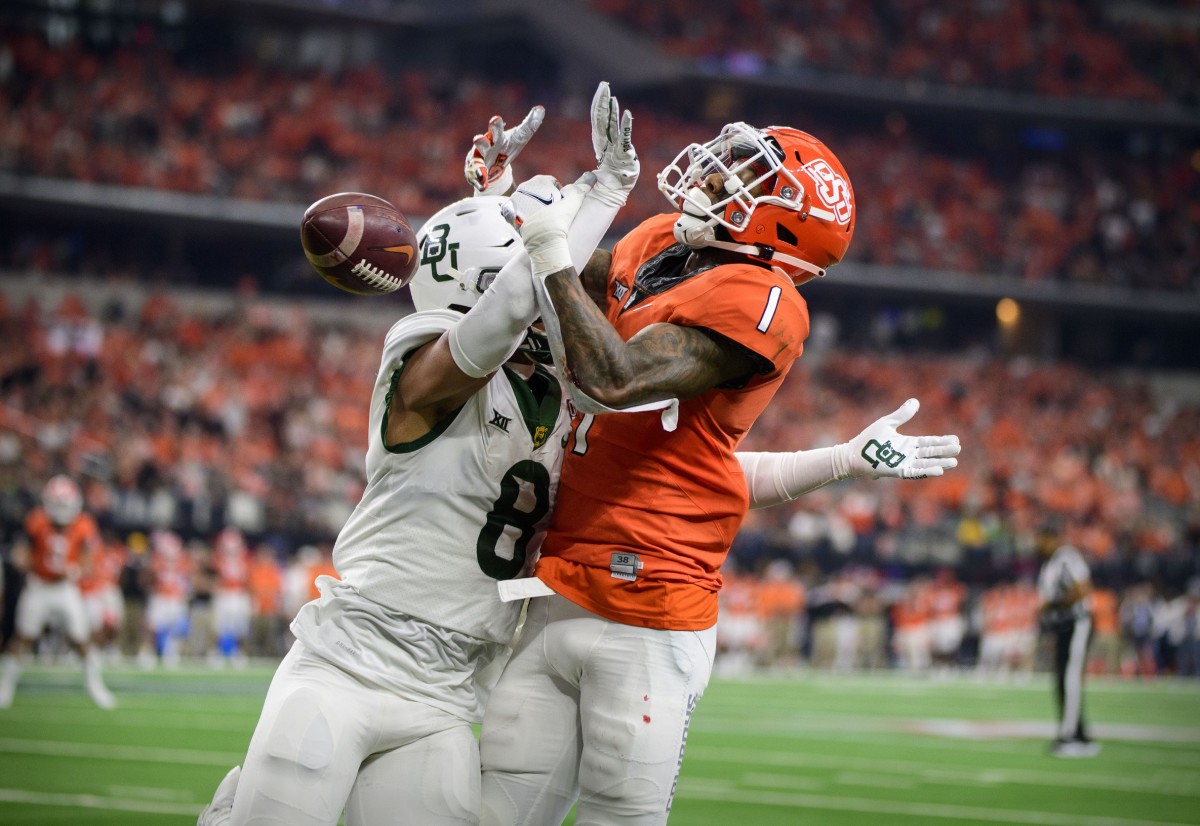 Dec 4, 2021; Arlington, TX, USA; Baylor Bears safety Jalen Pitre (8) breaks up a pass intended for Oklahoma State Cowboys wide receiver Tay Martin (1) during the second quarter in the Big 12 Conference championship game at AT&T Stadium. Mandatory Credit: Jerome Miron-USA TODAY Sports