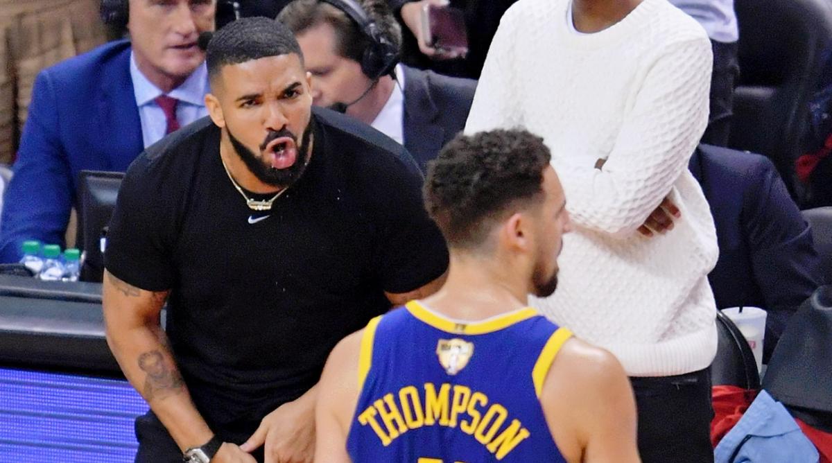 Jun 10, 2019; Toronto, Ontario, CAN; Recording artist Drake reacts to a play during the second quarter in game five of the 2019 NBA Finals between the Golden State Warriors and the Toronto Raptors at Scotiabank Arena.