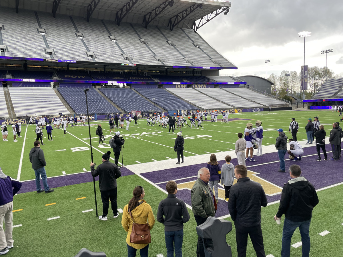 Former coaches, players, parents and recruits came out for the UW scrimmage.