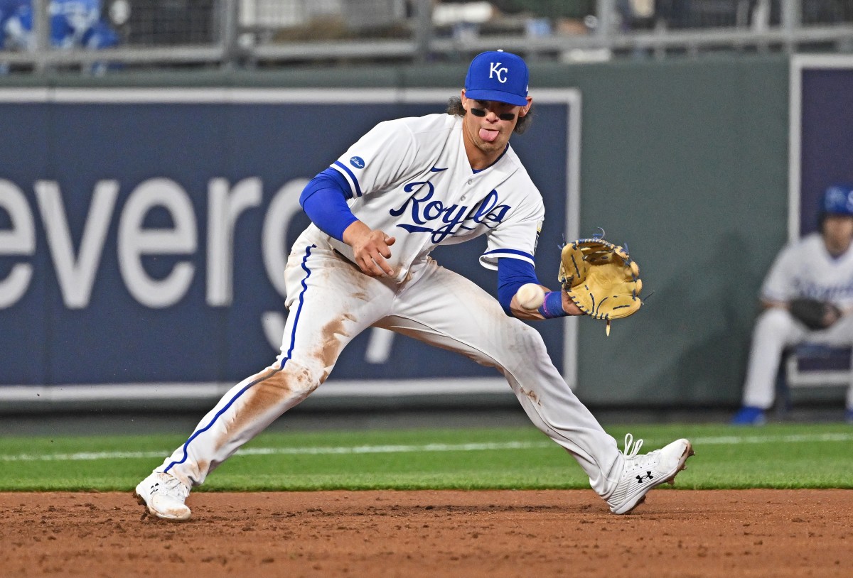 Apr 14, 2022; Kansas City, Missouri, USA; Kansas City Royals third baseman Bobby Witt Jr. (7) fields a ground ball during the third inning against the Detroit Tigers at Kauffman Stadium. Mandatory Credit: Peter Aiken-USA TODAY Sports