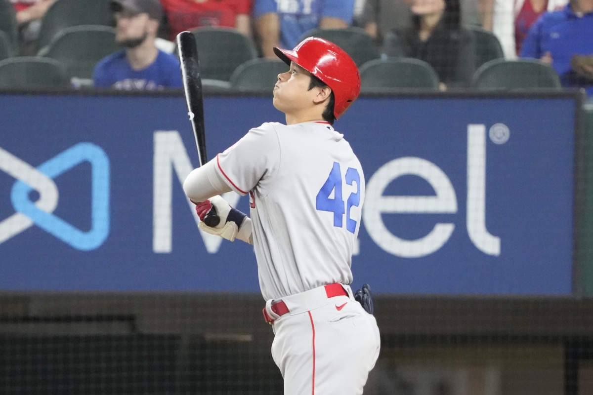 Apr 15, 2022; Arlington, Texas, USA; Los Angeles Angels designated hitter Shohei Ohtani follows through on his two run home run against the Texas Rangers during the fifth inning of a baseball game at Globe Life Field. Mandatory Credit: Jim Cowsert-USA TODAY Sports