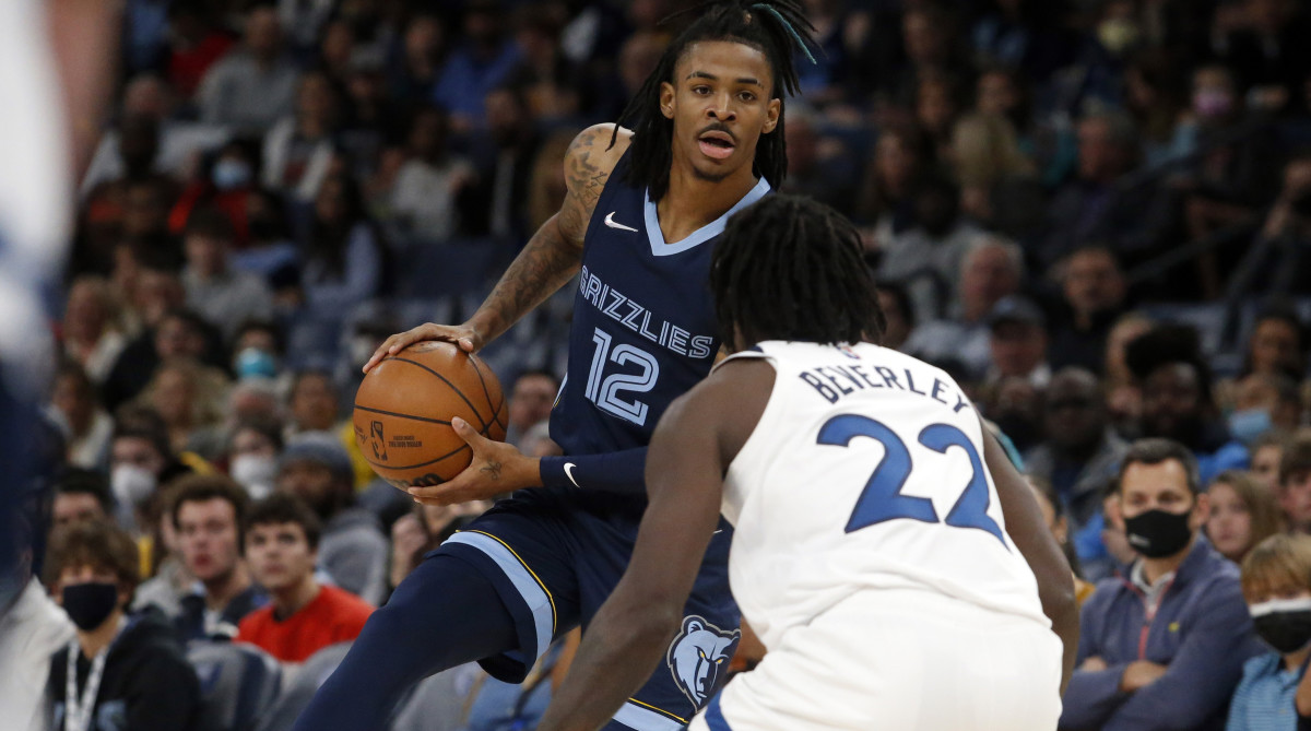 Memphis Grizzles guard Ja Morant (12) looks for an open lane during the second half against the Minnesota Timberwolves at FedExForum.