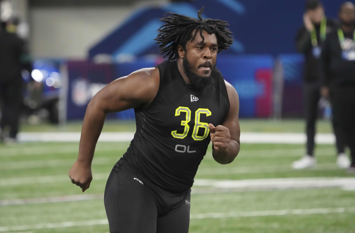 Mar 4, 2022; Indianapolis, IN, USA; Memphis offensive lineman Dylan Parham (OL36) goes through drills during the 2022 NFL Scouting Combine at Lucas Oil Stadium.