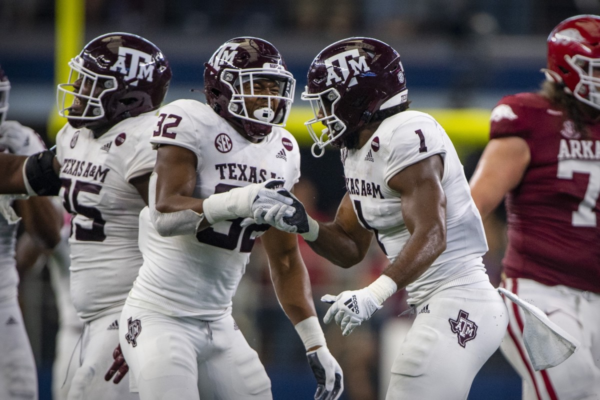 Sep 25, 2021; Arlington, Texas, USA; Texas A&M Aggies linebacker Andre White Jr. (32) and linebacker Aaron Hansford (1) in action during the game between the Arkansas Razorbacks and the Texas A&M Aggies at AT&T Stadium.