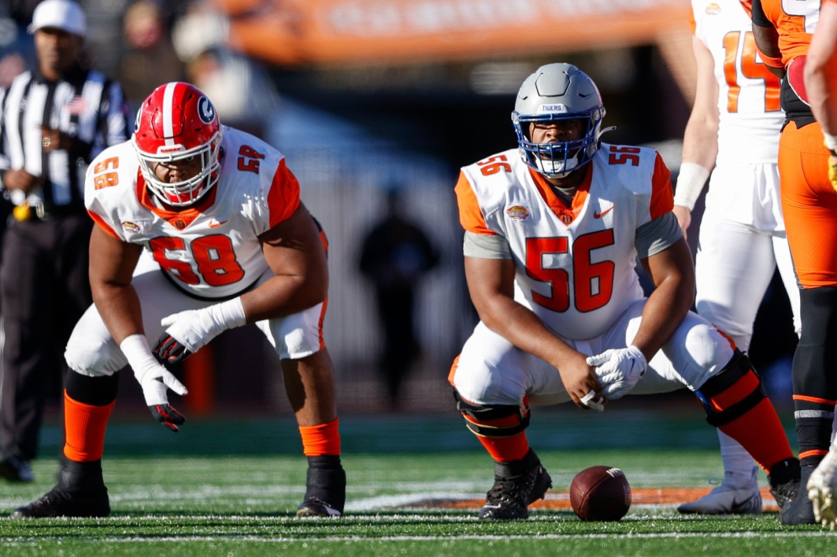Feb 5, 2022; Mobile, AL, USA; American squad offensive lineman Jamaree Salyer of Georgia (68) and offensive lineman Dylan Parham of Memphis (56) in the second half against the National squad during the Senior bowl at Hancock Whitney Stadium. Mandatory Credit: Nathan Ray Seebeck-USA TODAY Sports