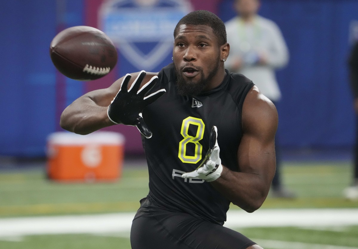 Mar 4, 2022; Indianapolis, IN, USA; Mississippi running back Snoop Conner (RB08) goes through drills during the 2022 NFL Scouting Combine at Lucas Oil Stadium.
