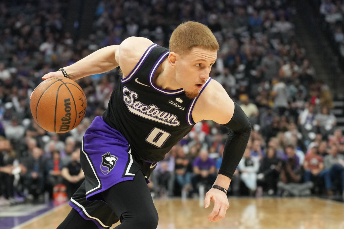 Apr 5, 2022; Sacramento, California, USA; Sacramento Kings guard Donte DiVincenzo (0) dribbles during the first quarter against the New Orleans Pelicans at Golden 1 Center.