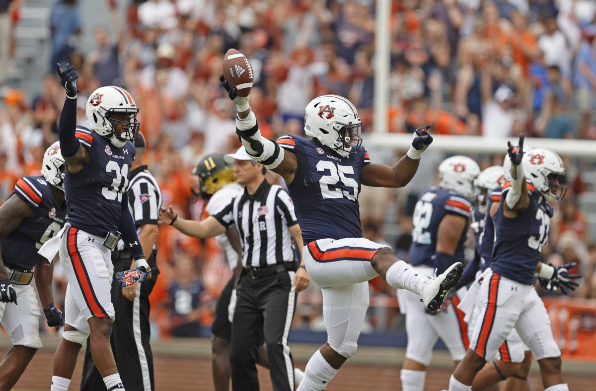 Sep 11, 2021; Auburn, Alabama, USA; Auburn Tigers defensive end Colby Wooden (25) celebrates a fumble recovery during the third quarter against the Alabama State Hornets at Jordan-Hare Stadium. Mandatory Credit: John Reed-USA TODAY Sports