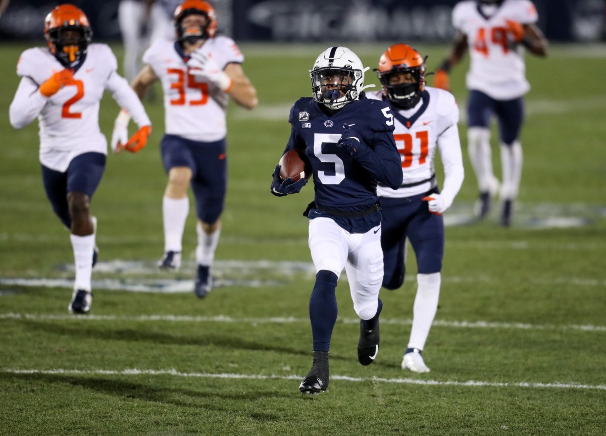 Penn State receiver Jahan Dotson (5) returns the ball for a touchdown against Illinois. Mandatory Credit: Matthew OHaren-USA TODAY Sports