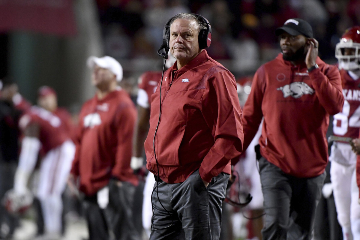 Arkansas coach Sam Pittman stands on the sideline during the second half of an NCAA college football game against Missouri, Friday, Nov. 26, 2021, in Fayetteville, Ark. (AP Photo/Michael Woods)