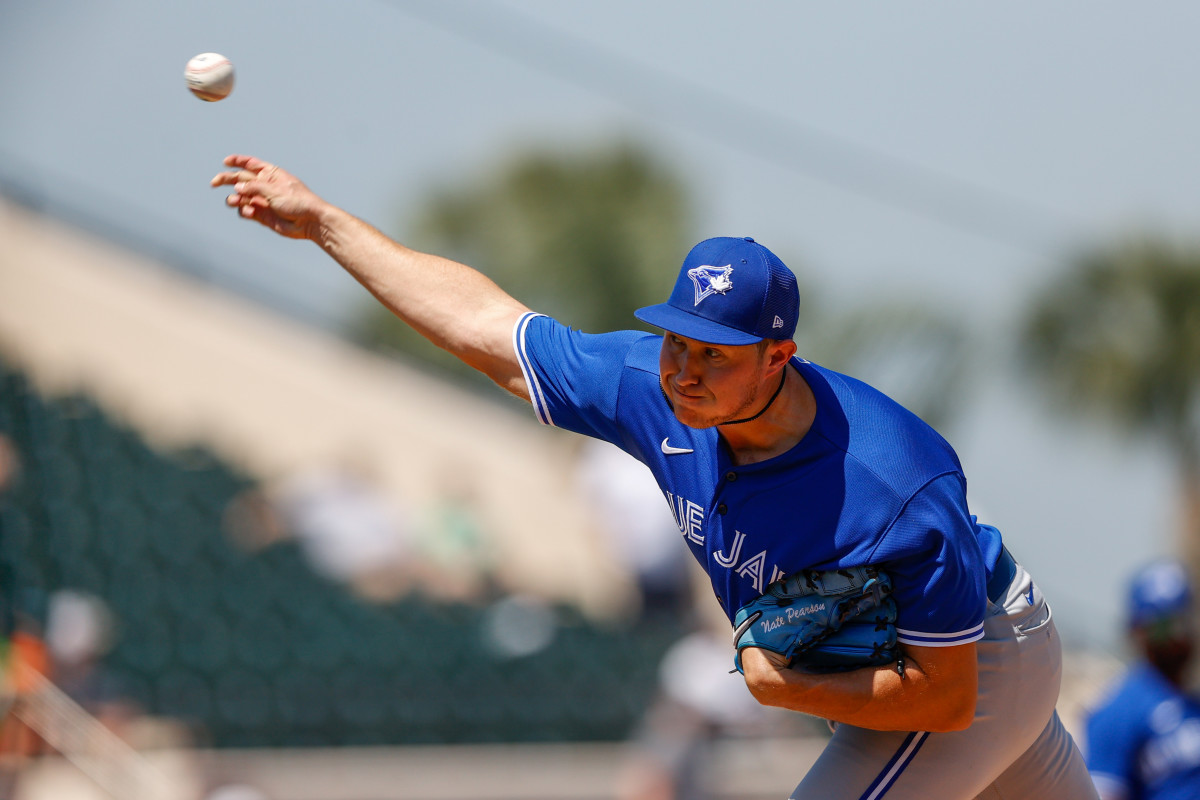 Mar 21, 2022; Lakeland, Florida, USA; Toronto Blue Jays pitcher Nate Pearson throws a pitch in the third inning against the Detroit Tigers during spring training at Publix Field at Joker Marchant Stadium. Mandatory Credit: Nathan Ray Seebeck-USA TODAY Sports