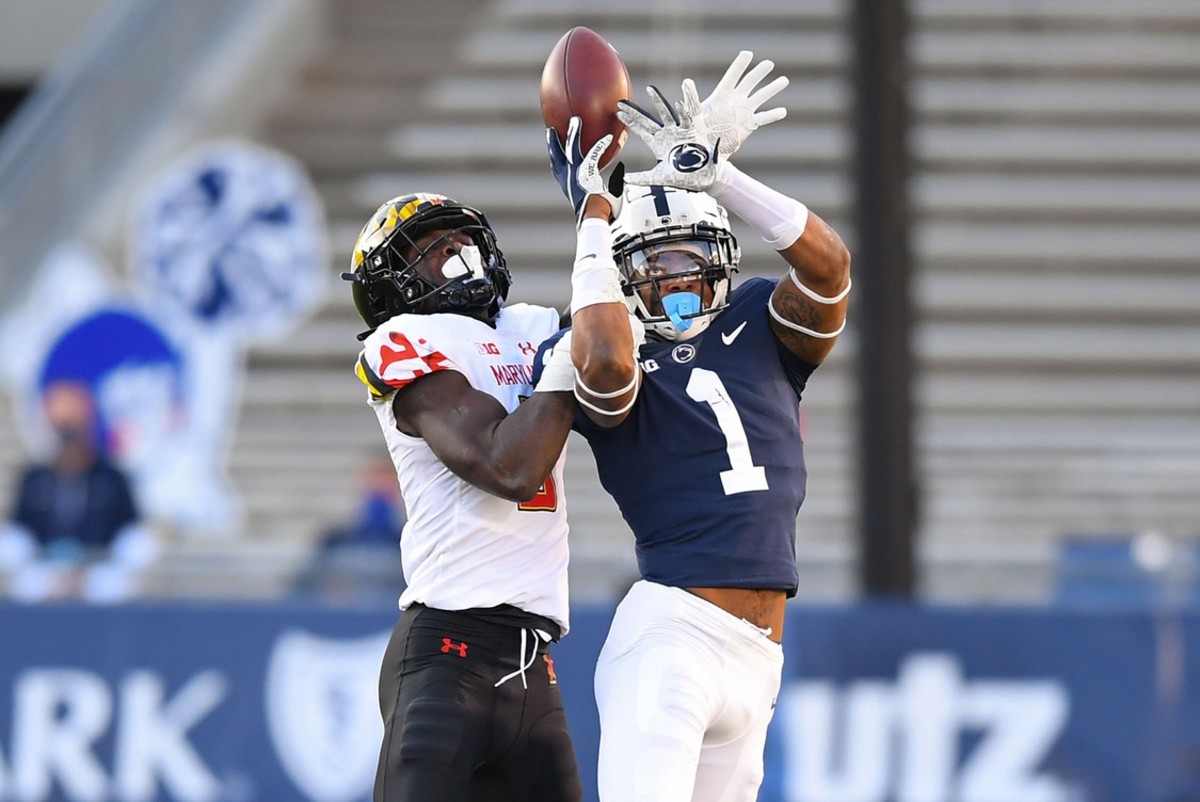 Penn State safety Jaquan Brisker (1) breaks up a pass intended for Maryland receiver Rakim Jarrett (5). Mandatory Credit: Rich Barnes-USA TODAY