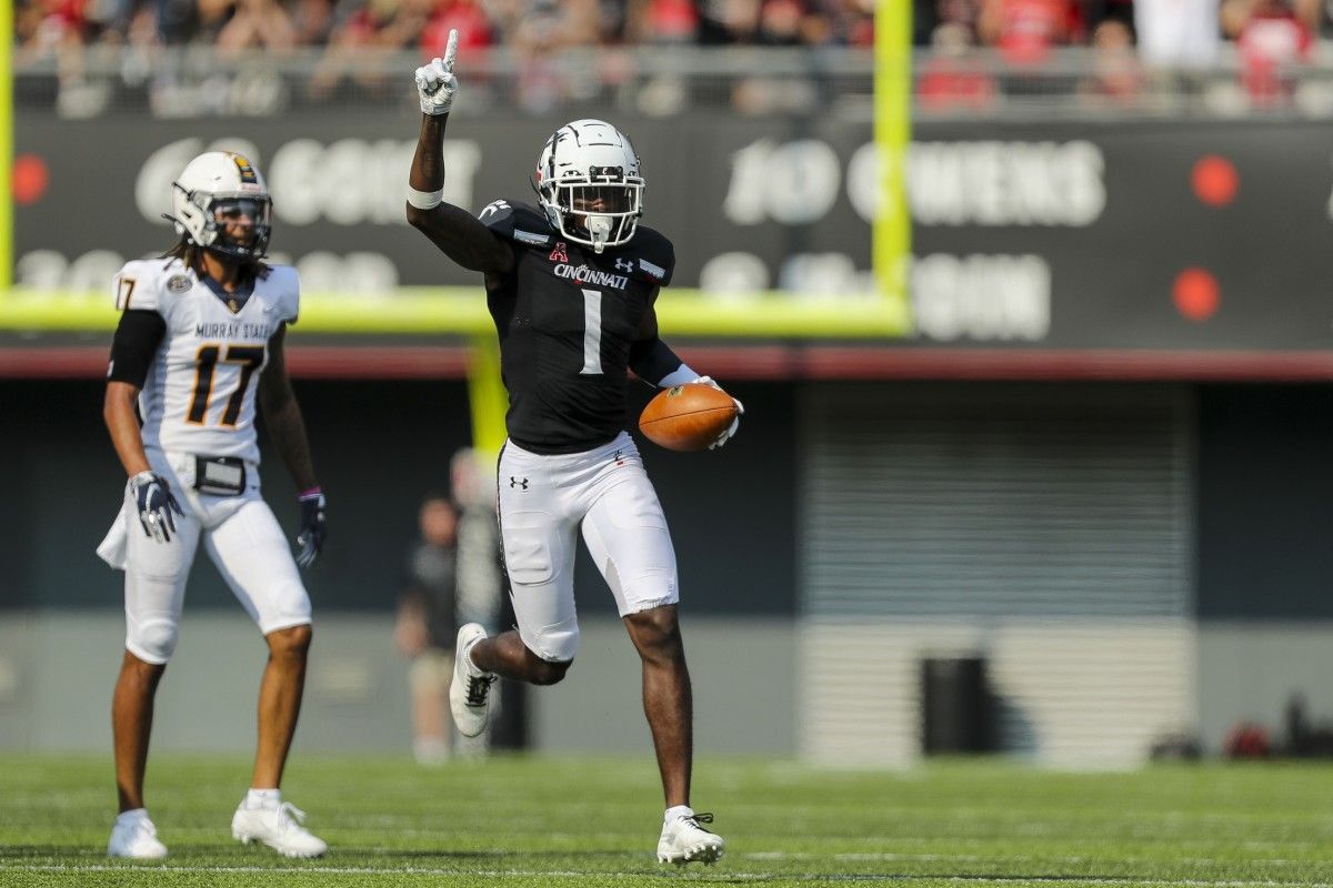 Ahmad Gardner (1) celebrates an interception