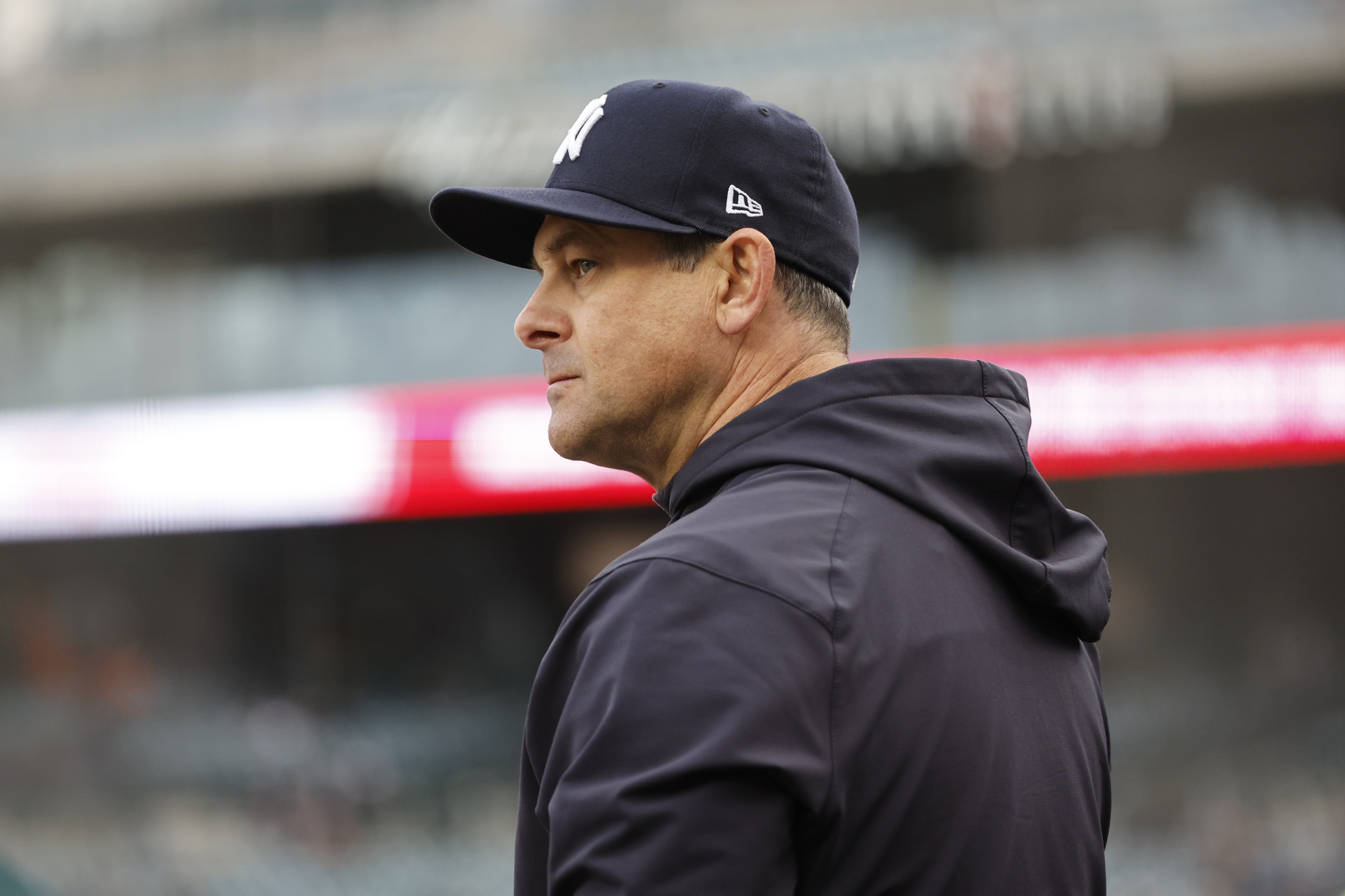 aaron boone looks on from dugout.