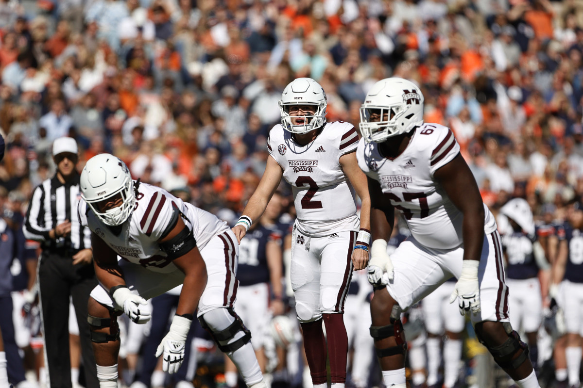Nov 13, 2021; Auburn, Alabama, USA; Mississippi State Bulldogs quarterback Will Rogers (2) as changes the play during the first quarter against the Auburn Tigers at Jordan-Hare Stadium. Mississippi State offensive lineman Charles Cross (67) listens at right. Mandatory Credit: John Reed-USA TODAY Sports