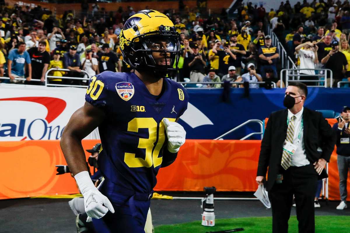 Michigan defensive back Daxton Hill takes the field for warmups before the Orange Bowl against Georgia on Friday, Dec. 31, 2021, in Miami Gardens, Florida.