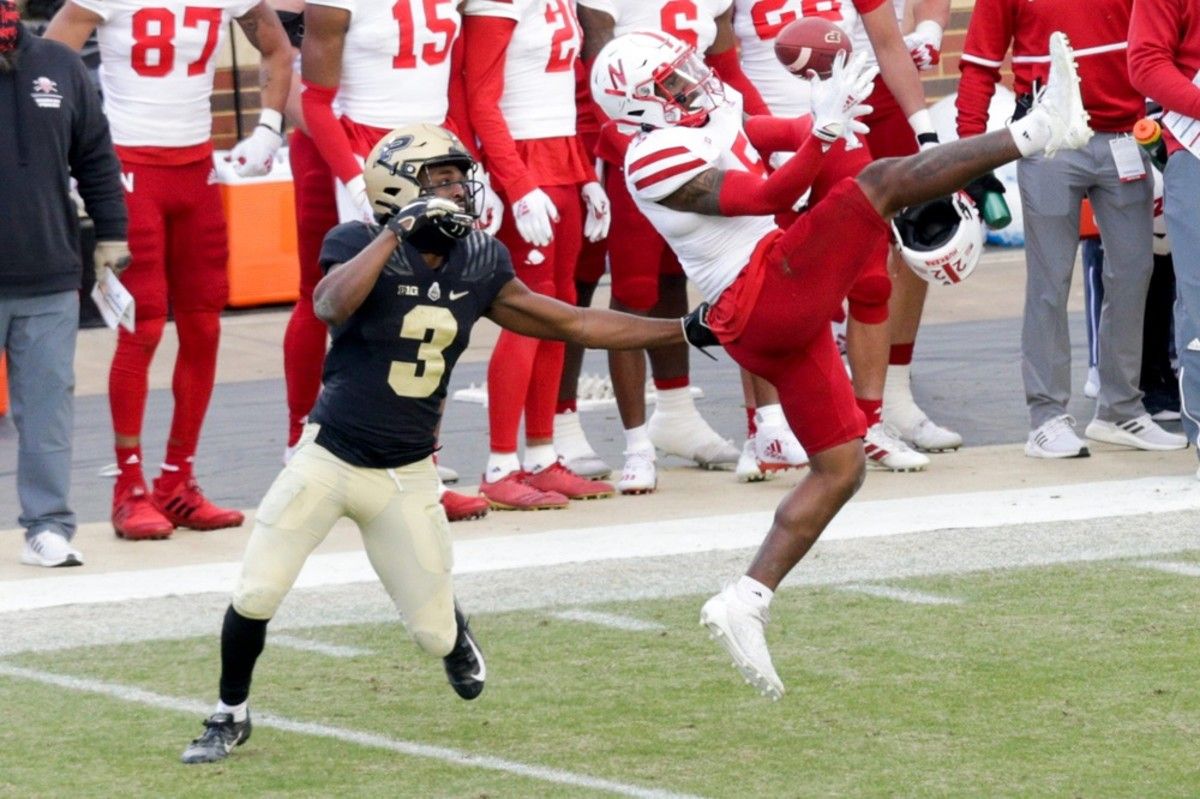 Nebraska cornerback Cam Taylor-Britt (5) goes up to attempt to intercept a pass intended for Purdue wide receiver David Bell (3) during the fourth quarter of an NCAA college football game, Saturday, Dec. 5, 2020 at Ross-Ade Stadium in West Lafayette. Cfb Purdue Vs Nebraska
