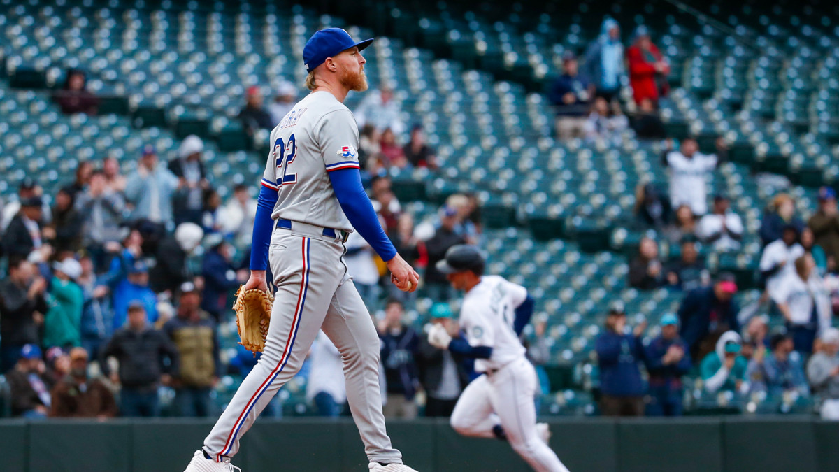Apr 19, 2022; Seattle, Washington, USA; Texas Rangers starting pitcher Jon Gray (22) walks back to the mound after surrendering a solo home run to Seattle Mariners right fielder Jarred Kelenic (10)during the second inning at T-Mobile Park. Mandatory Credit: Joe Nicholson-USA TODAY Sports