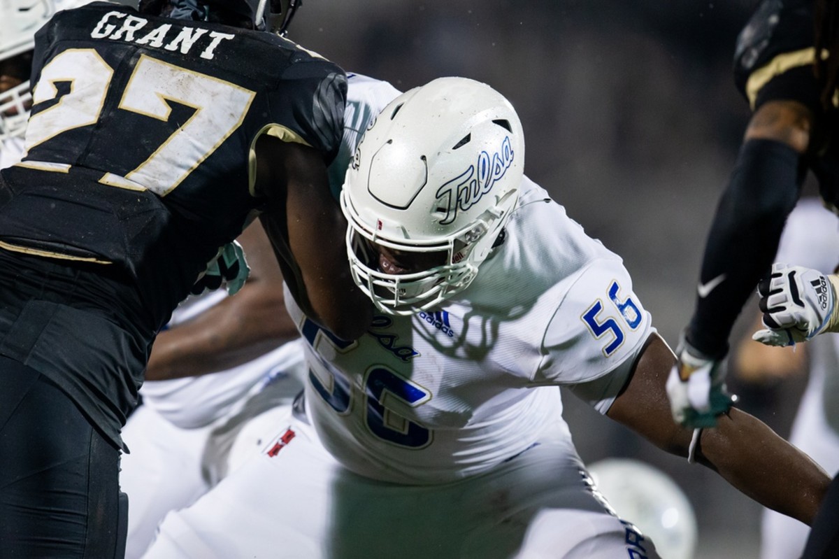 Oct 3, 2020; Orlando, Florida, USA; Tulsa Golden Hurricane offensive tackle Tyler Smith (56) guards during the second quarter of a game against the UCF Knights at Spectrum Stadium. Mandatory Credit: Mary Holt-USA TODAY Sports