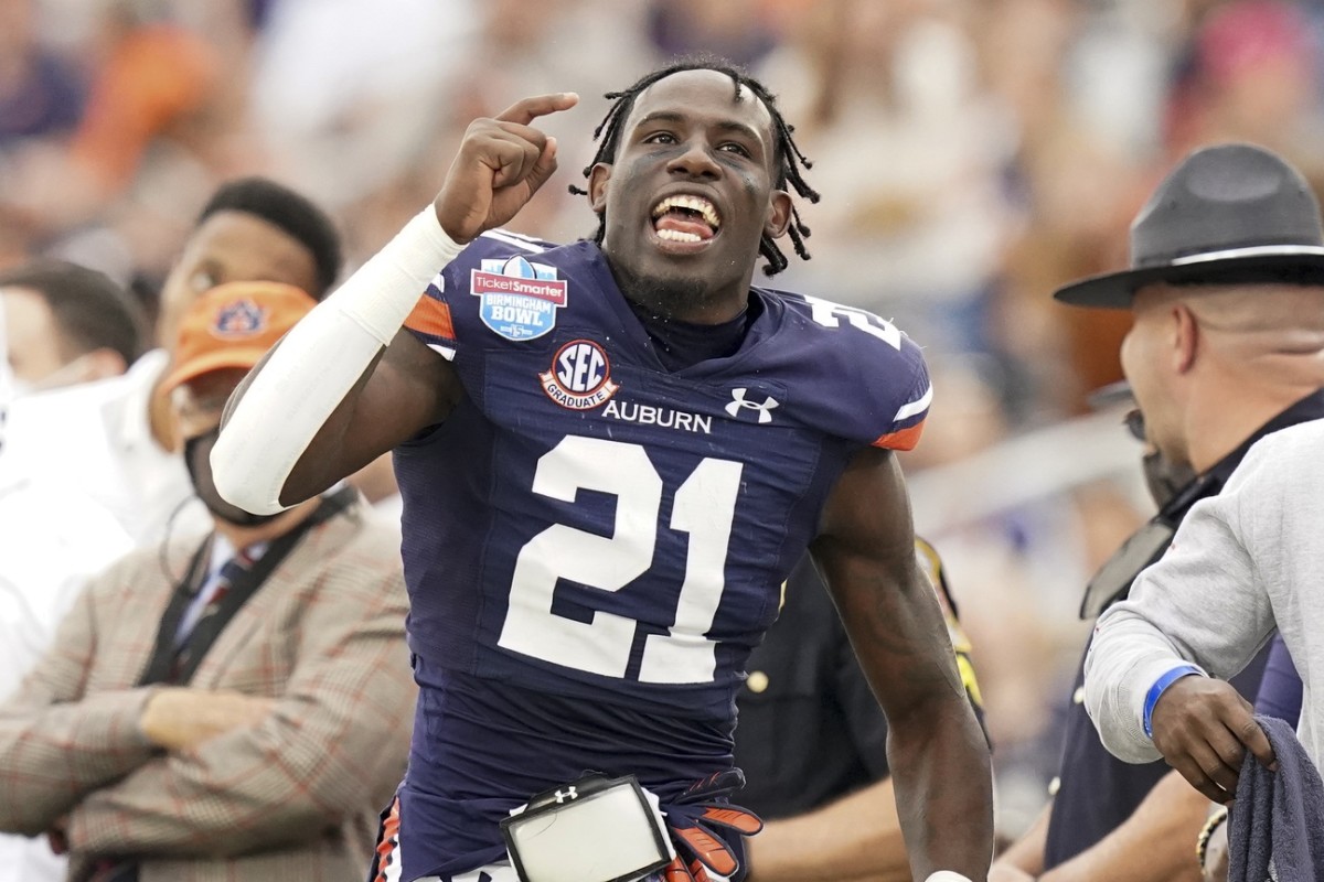 Dec 28, 2021; Birmingham, Alabama, USA; Auburn Tigers safety Smoke Monday (21) reacts after a play from the sideline during the second half against the Houston Cougars during the 2021 Birmingham Bowl at Protective Stadium. Mandatory Credit: Marvin Gentry-USA TODAY Sports