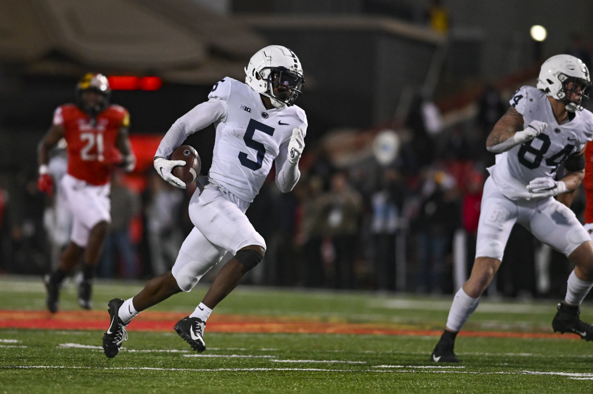 Nov 6, 2021; College Park, Maryland, USA; Penn State Nittany Lions wide receiver Jahan Dotson (5) runs for a second half touchdown against the Maryland Terrapins at Capital One Field at Maryland Stadium. Mandatory Credit: Tommy Gilligan-USA TODAY Sports