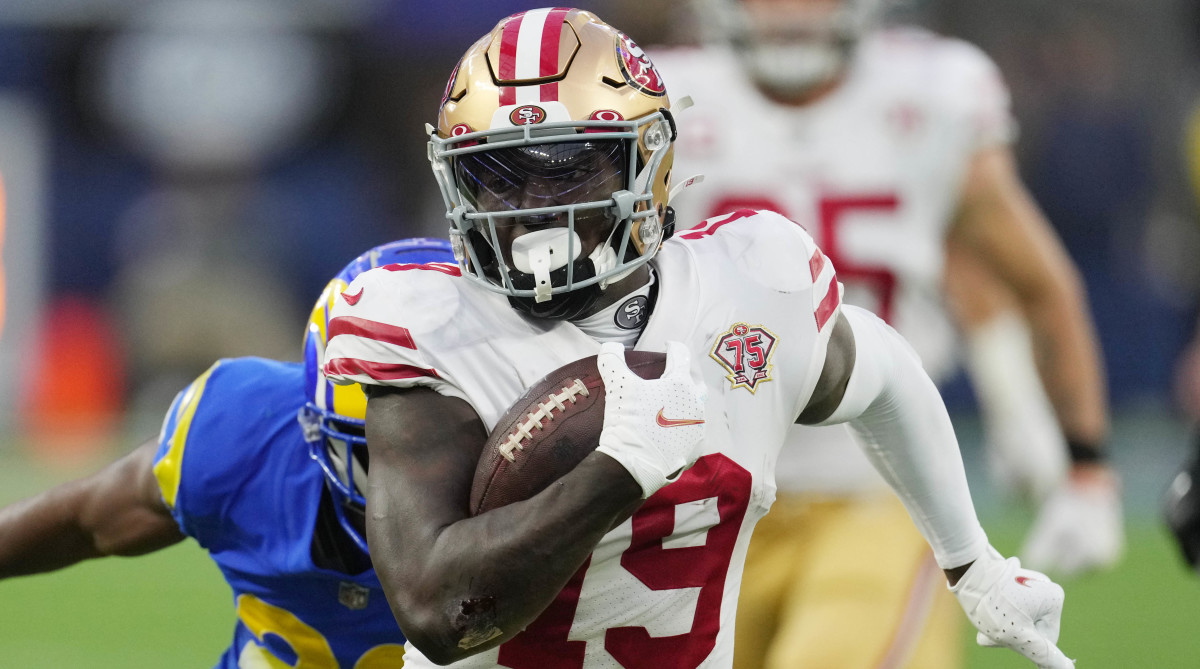 San Francisco 49ers wide receiver Deebo Samuel (19) runs after a catch against the Los Angeles Rams in the first half during the NFC Championship Game at SoFi Stadium.