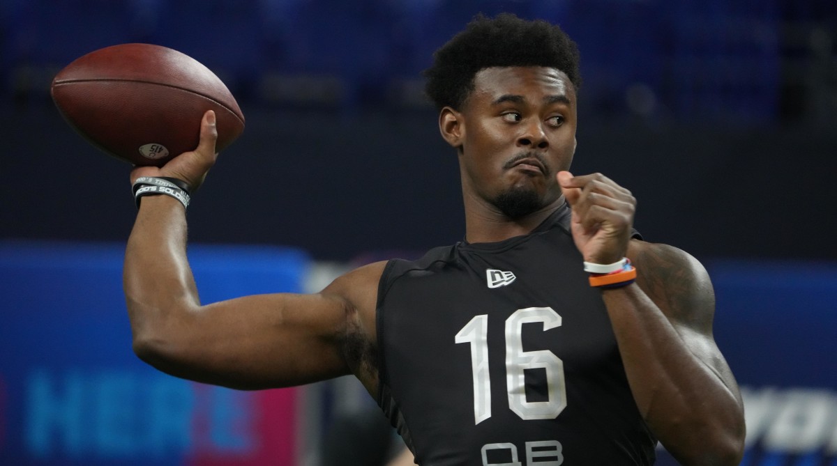 Liberty quarterback Malik Willis (QB16) goes through drills during the 2022 NFL Scouting Combine at Lucas Oil Stadium.