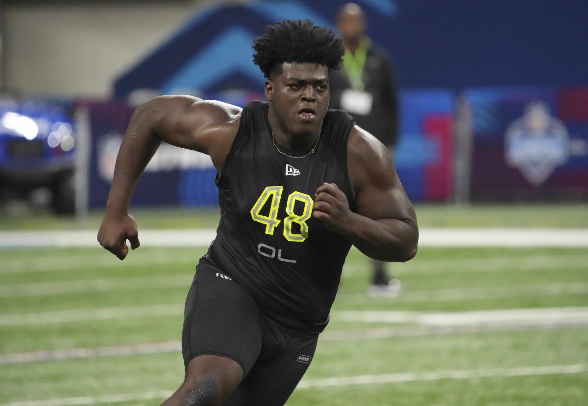 Mar 4, 2022; Indianapolis, IN, USA; Tulsa offensive lineman Tyler Smith (OL48) goes through drills during the 2022 NFL Scouting Combine at Lucas Oil Stadium.
