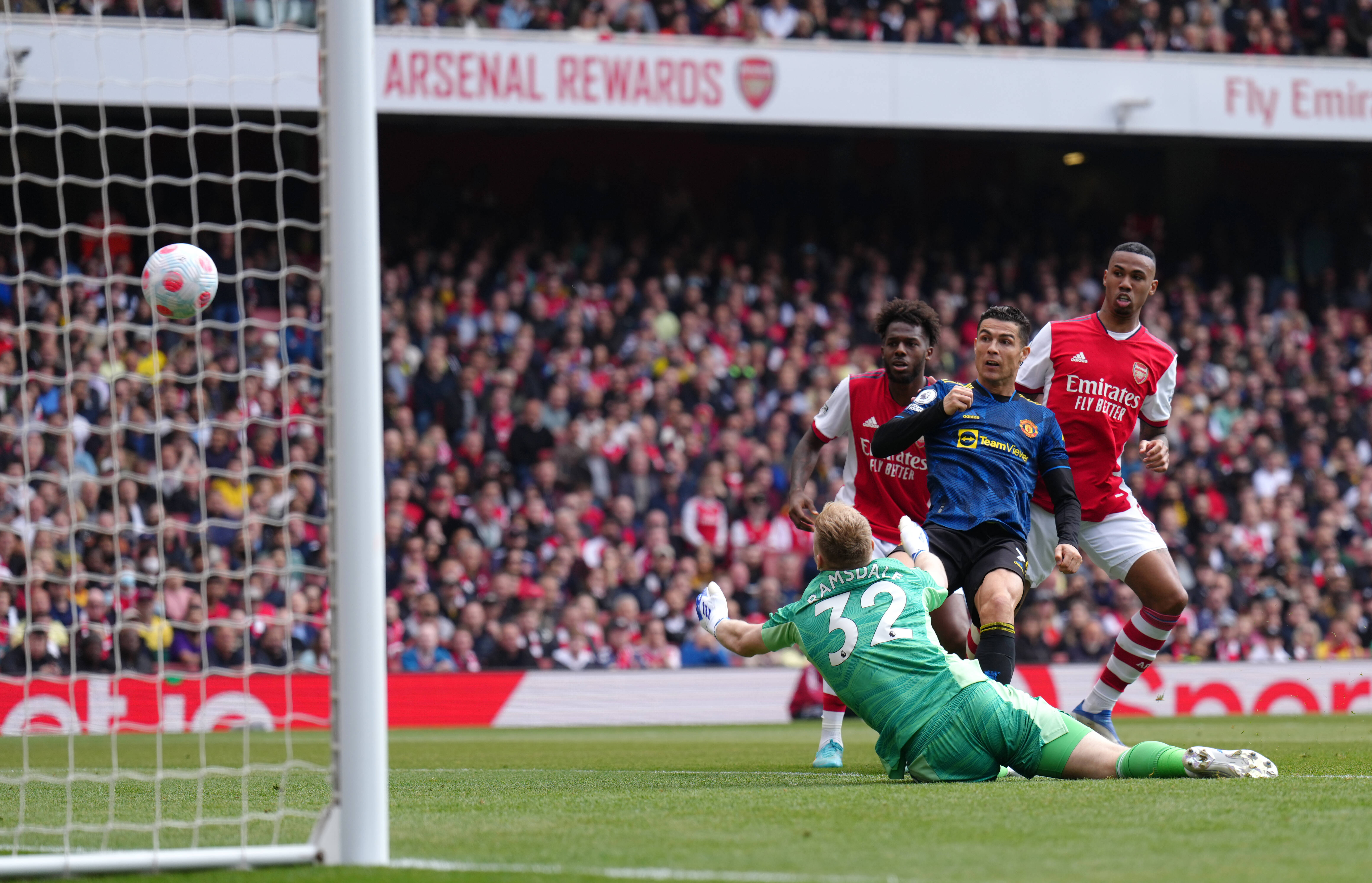 Cristiano Ronaldo pictured scoring his 100th Premier League goal for Manchester United at Arsenal's Emirates Stadium in April 2022