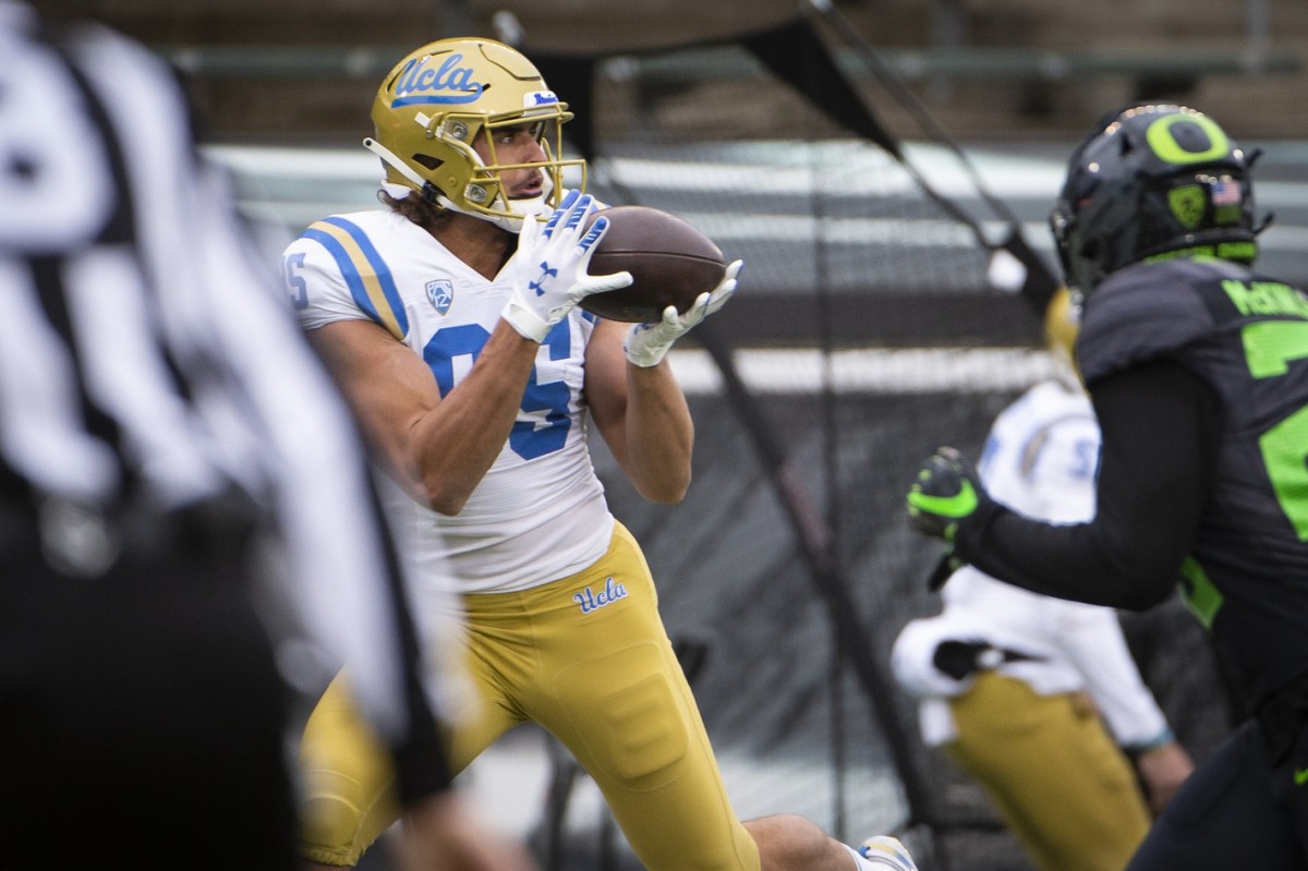 UCLA Bruins tight end Greg Dulcich (85) catches a pass for a touchdown against the Oregon Ducks. Mandatory Credit: Troy Wayrynen-USA TODAY 