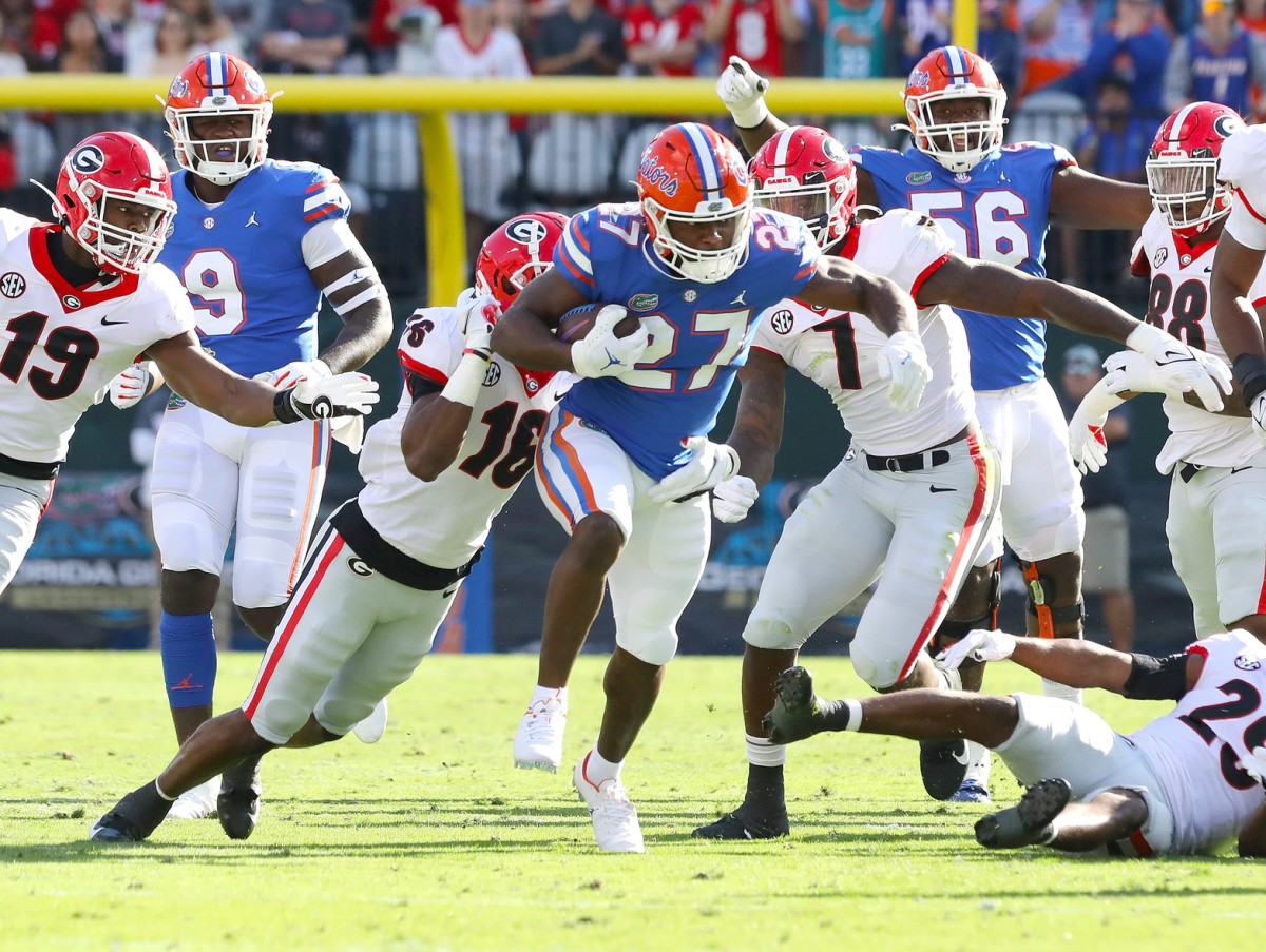 Florida Gators running back Dameon Pierce (27) breaks free for a first down against Georgia.  Brad McClenny/The Gainesville Sun / USA TODAY NETWORK