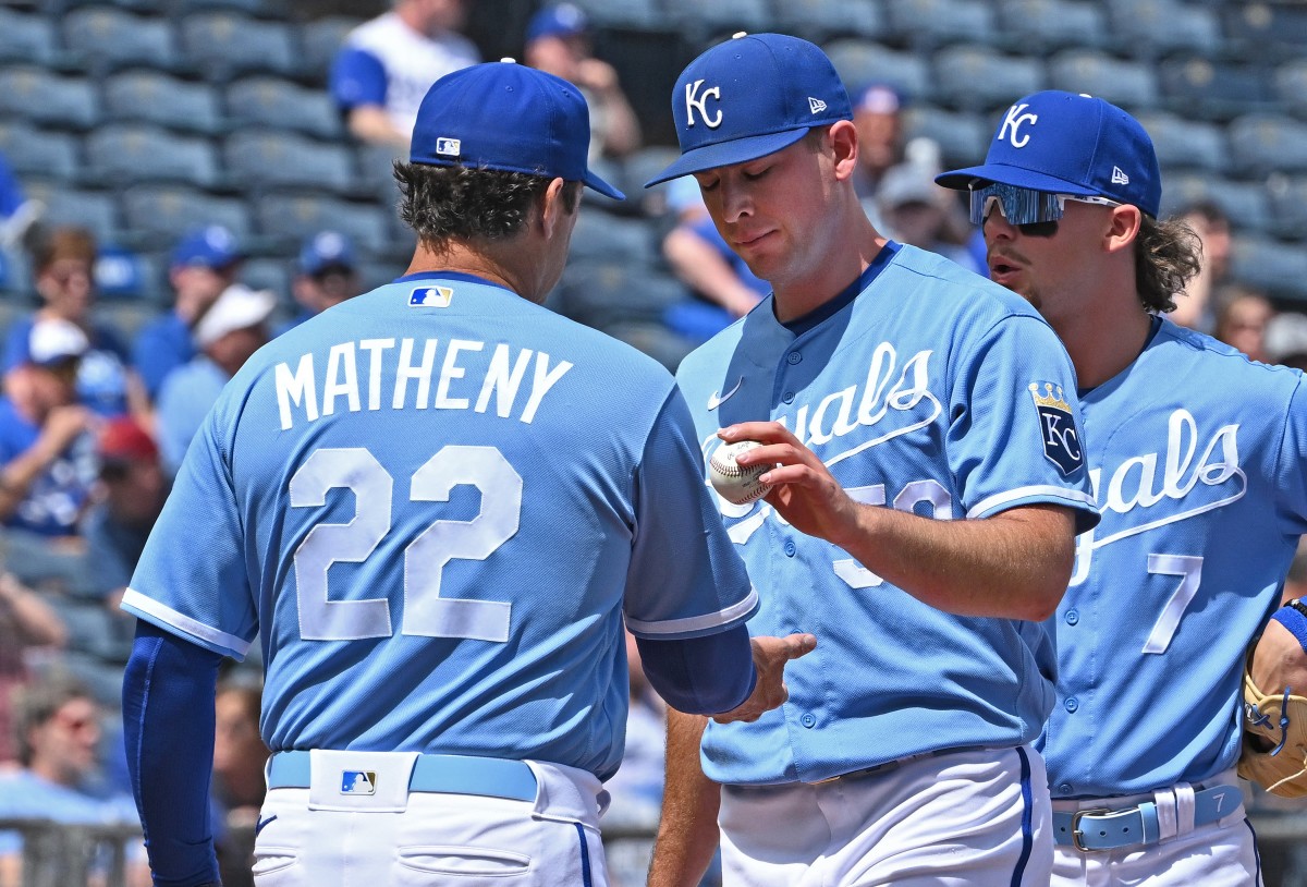 Apr 10, 2022; Kansas City, Missouri, USA; Kansas City Royals starting pitcher Kris Bubic (50) gets relieved by Kansas City Royals manager Mike Matheny (22) during the first inning against the Cleveland Guardians at Kauffman Stadium. Mandatory Credit: Peter Aiken-USA TODAY Sports
