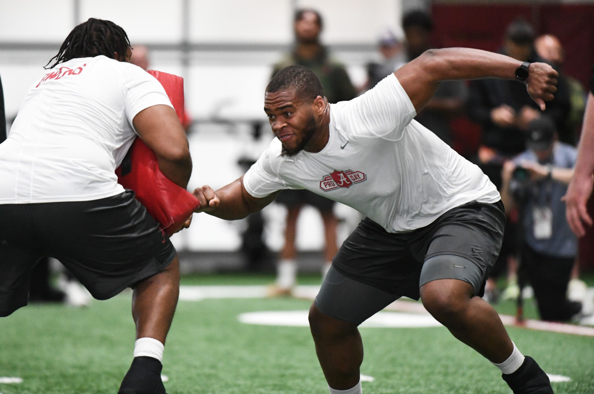 Alabama offensive lineman Chris Owens (79) and Alabama offensive lineman Evan Neal (73) work through a drill for NFL scouts during the University of Alabama s Pro Day at Hank Crisp Indoor Facility.