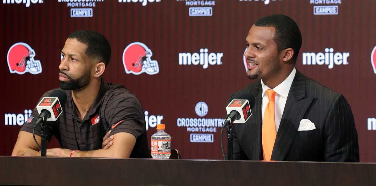 Cleveland Browns quarterback Deshaun Watson, right, smiles as he answers questions while general manager Andrew Berry looks on during Watson's introductory press conference at the Cleveland Browns Training Facility in Berea. Watsonpress File 2