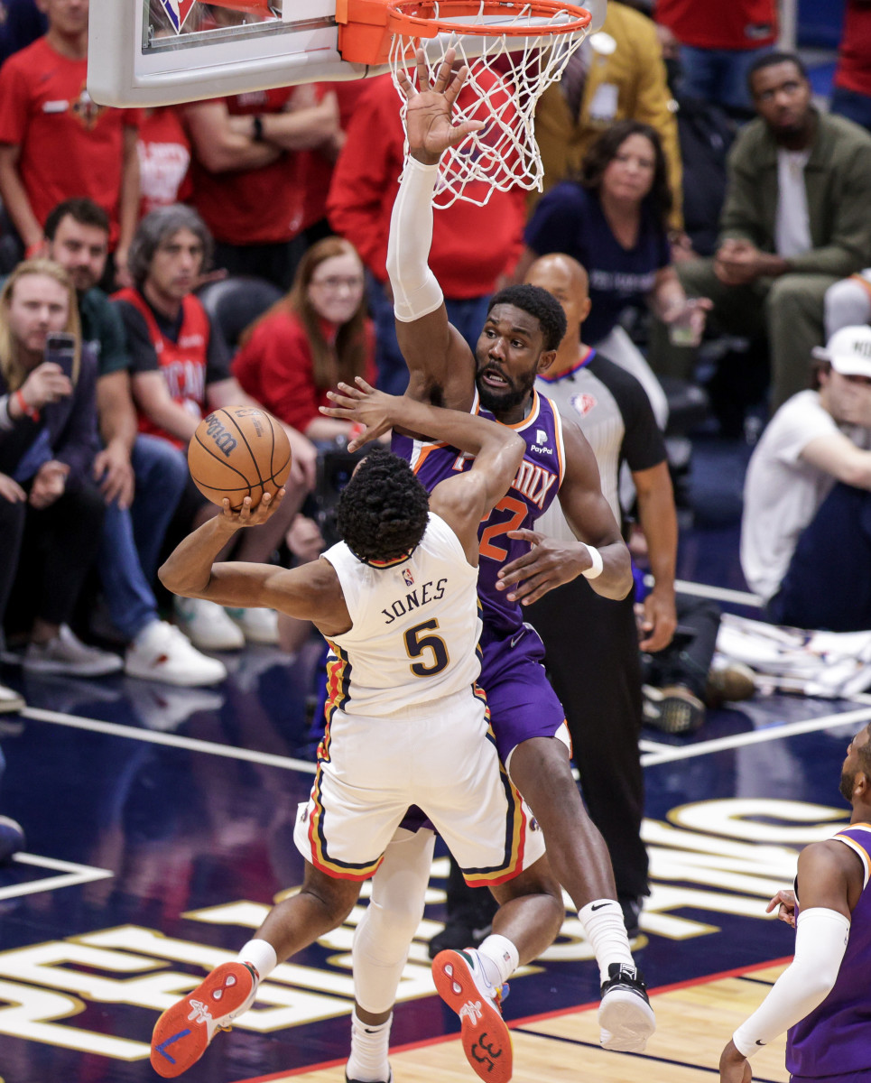 Apr 24, 2022; New Orleans, Louisiana, USA; New Orleans Pelicans forward Herbert Jones (5) shoots a jump shot against Phoenix Suns center Deandre Ayton (22) during the second half of game four of the first round of the 2022 NBA playoffs at Smoothie King Center. Mandatory Credit: Stephen Lew-USA TODAY Sports