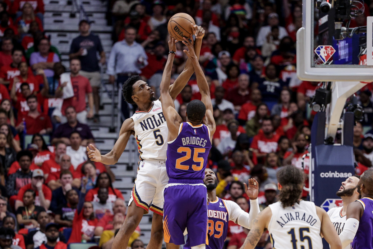 Apr 24, 2022; New Orleans, Louisiana, USA; New Orleans Pelicans forward Herbert Jones (5) blocks a shot of Phoenix Suns forward Mikal Bridges (25) during the first half of game four of the first round of the 2022 NBA playoffs at Smoothie King Center. Mandatory Credit: Stephen Lew-USA TODAY Sports