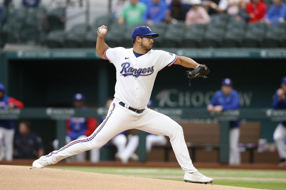 Apr 25, 2022; Arlington, Texas, USA; Texas Rangers starting pitcher Dane Dunning (33) throws a pitch in the first inning against the Houston Astros at Globe Life Field. Mandatory Credit: Tim Heitman-USA TODAY Sports