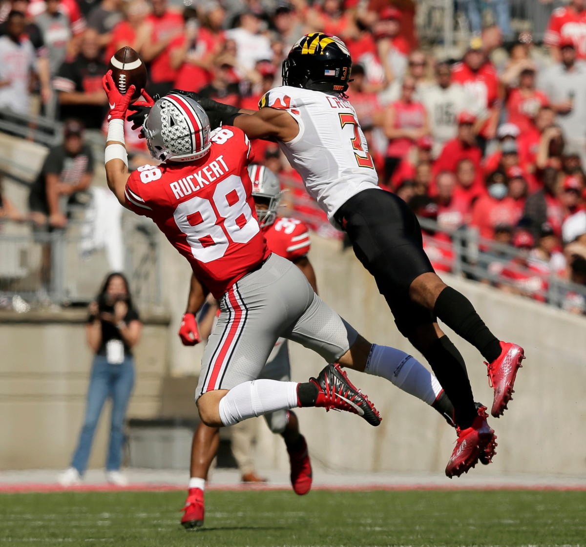 Ohio State Buckeyes tight end Jeremy Ruckert (88) can't reel in a pass as he is defended by Maryland Terrapins defensive back Nick Cross (3) during the first half of Saturday's NCAA Division I football game at Ohio Stadium in Columbus on October 9, 2021. Osu21mary Bjp 696