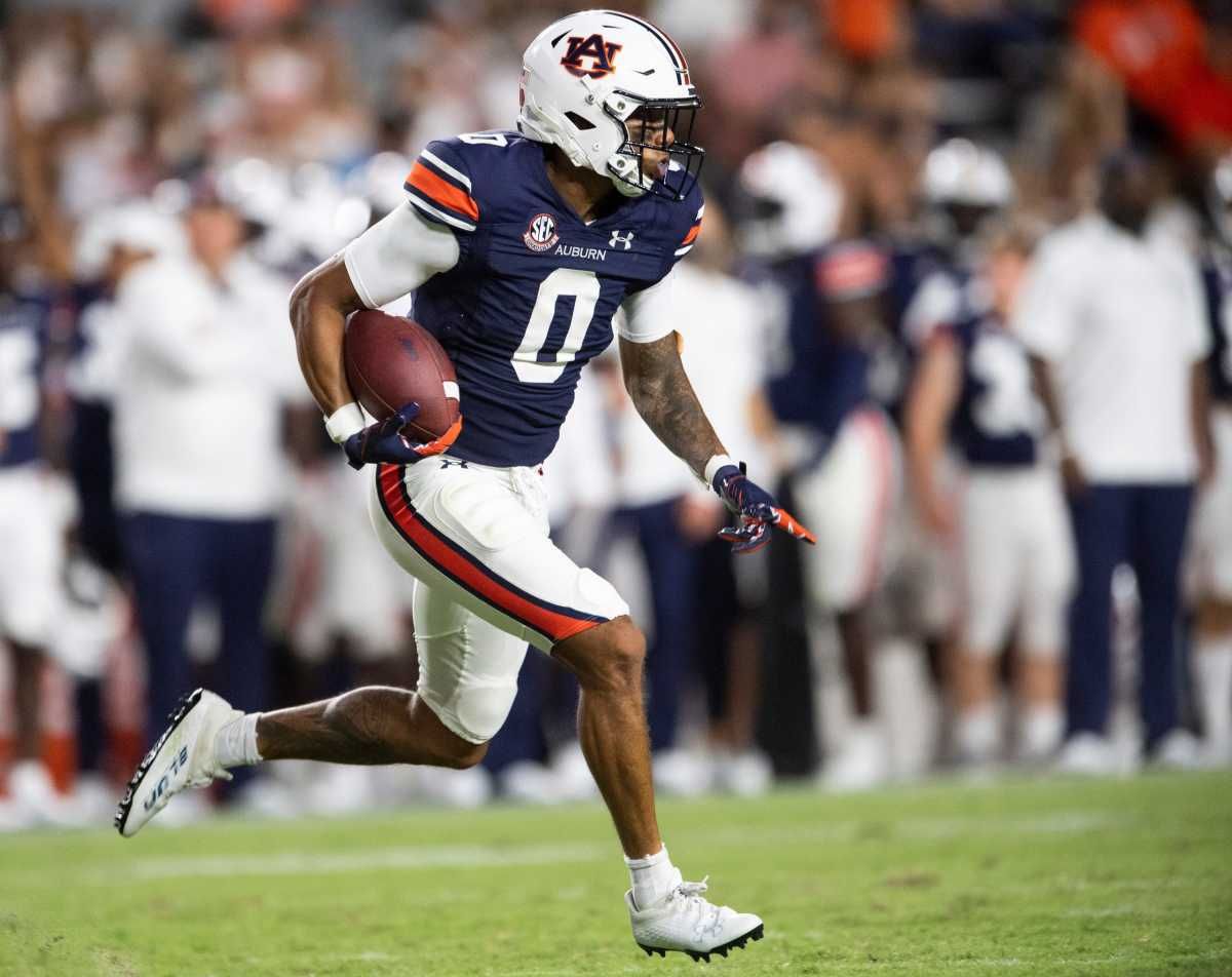 Auburn Tigers wide receiver Demetris Robertson (0) returns a punt at Jordan-Hare Stadium in Auburn, Ala., on Saturday, Sept. 4, 2021. Auburn Tigers defeats Akron Zips 60-10.
