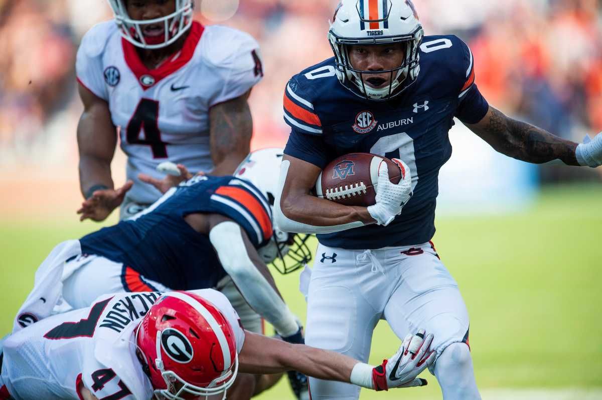 Auburn Tigers wide receiver Demetris Robertson (0) carries the ball against Georgia at Jordan-Hare Stadium in Auburn, Ala., on Saturday, Oct. 9, 2021. Auga07