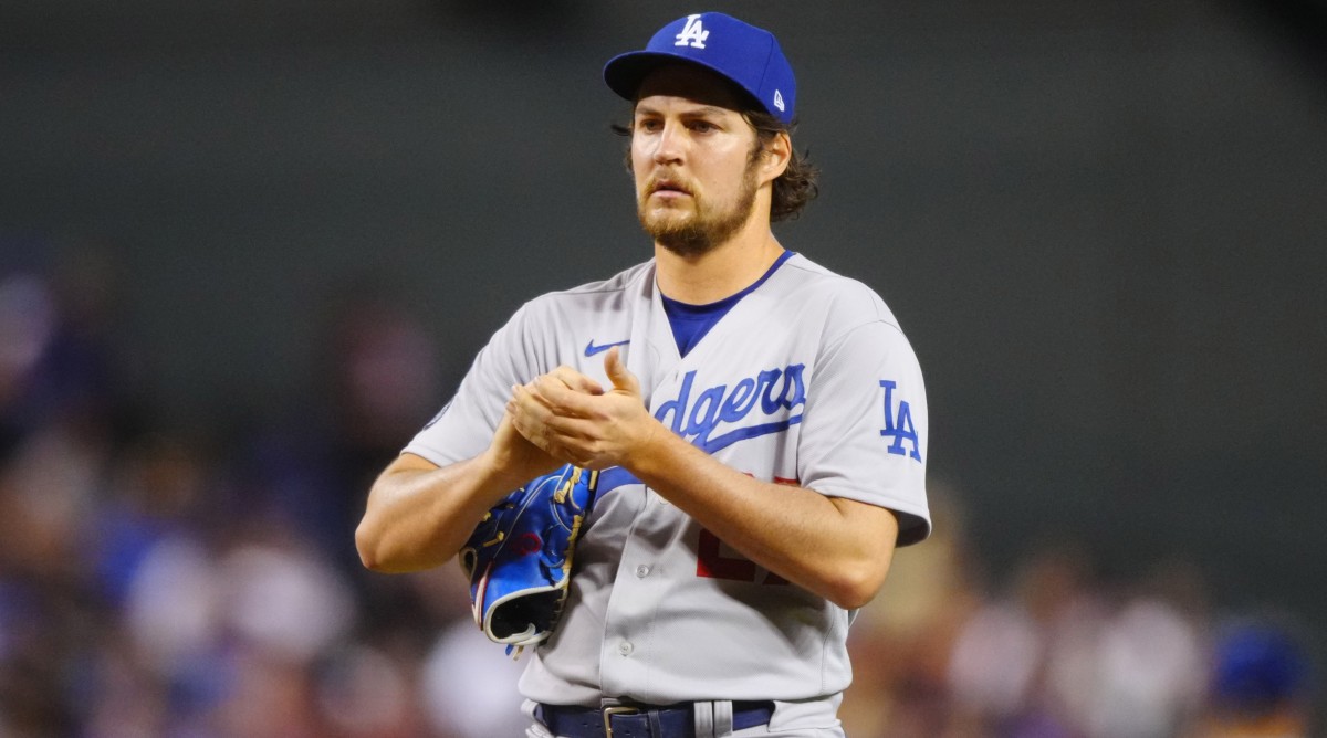 Dodgers pitcher Trevor Bauer stands on the mound.